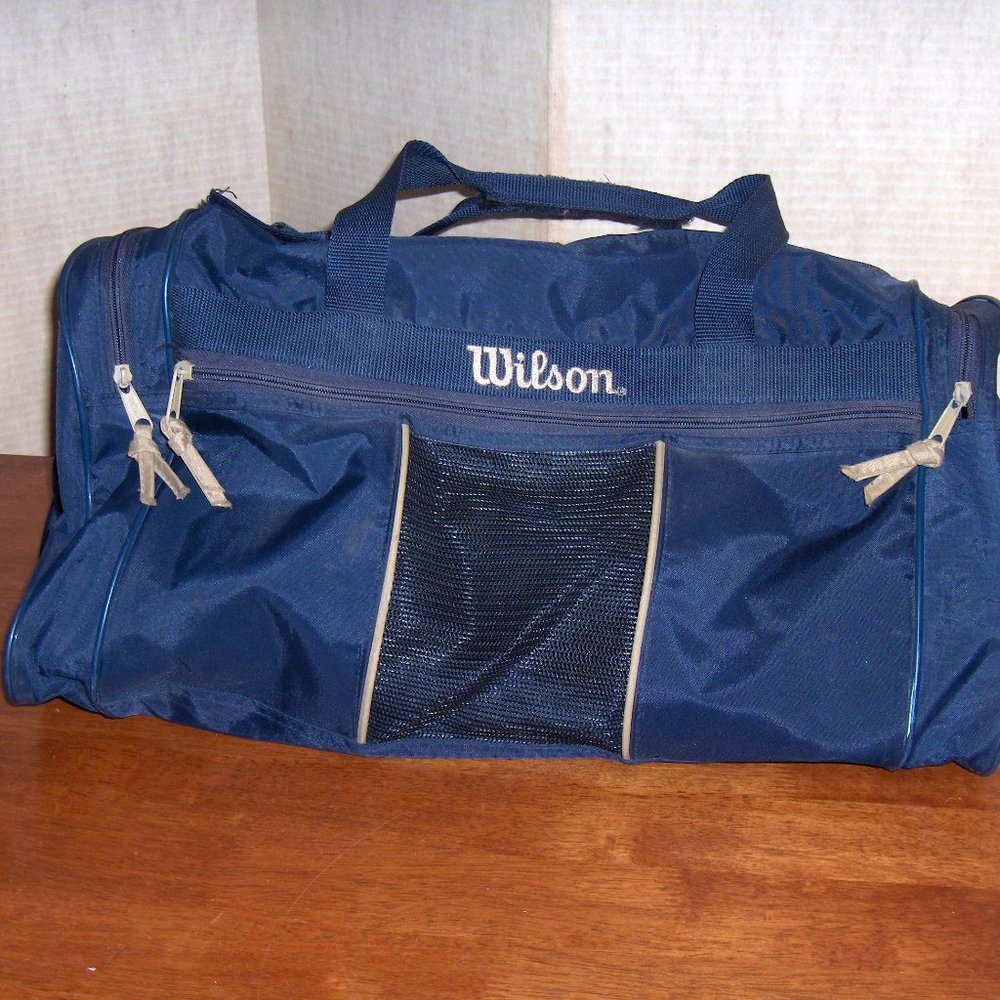 Wilson Duffel Bag, 19" x 9" x 12" High. Handles and shoulder strap
